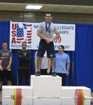 Mike Soha on the top step at the USA Weightlifting National Collegiate Championships, 2009